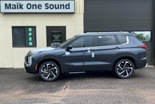 White 2024 Mitsubishi Outlander SUV with premium window film